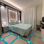 Aquamarina Pavoncella Rossa & 4* Porto Pino